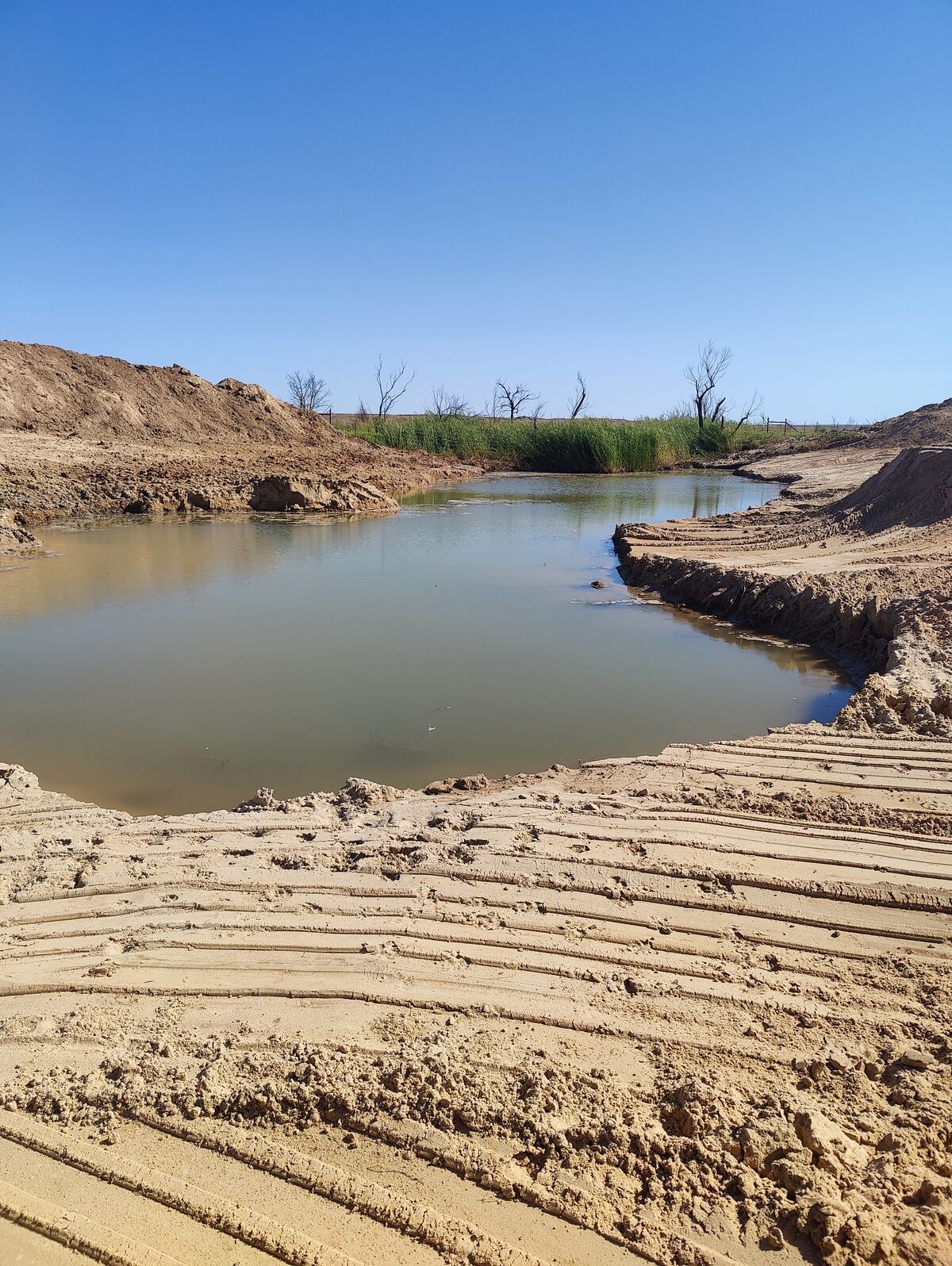 Pasture Tech pond construction site